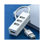 Vue latérale du hub USB montrant les quatre ports et l'entrée pour alimenter la station