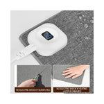 Vue latérale de la souris chauffante électrique anti-dérapage GEAR4PC en noir avec câble USB visible